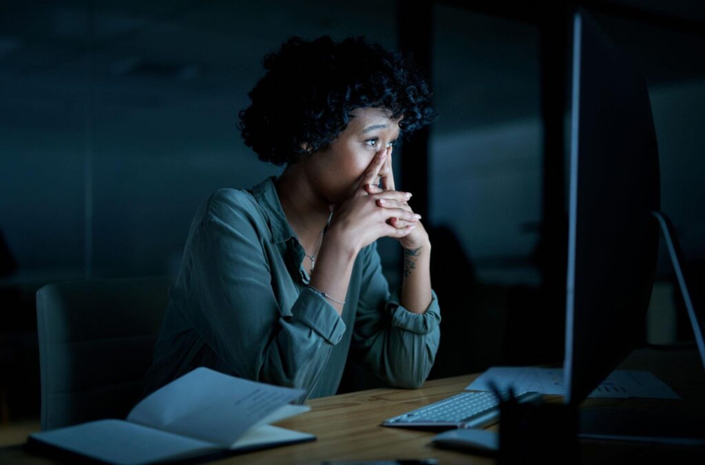person stressed about finances and career decisions seeking clarity