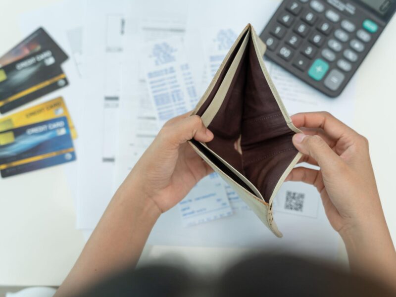 person stressed about financial problems and lack of money seeking guidance