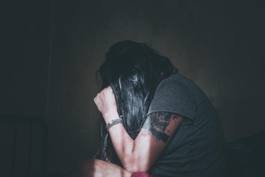 Man thinking deeply about life and financial stress