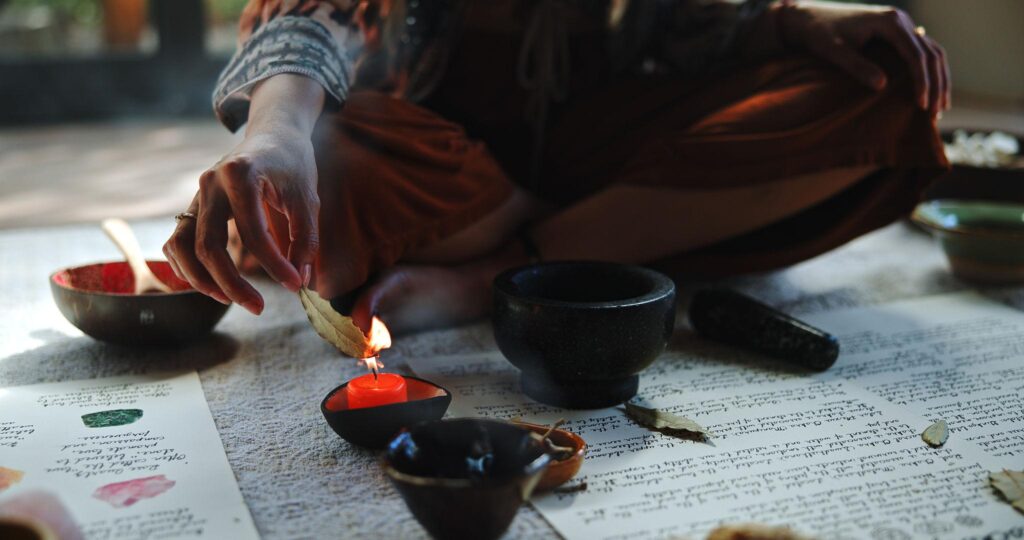 Spiritual cleansing ritual with smoke and candles